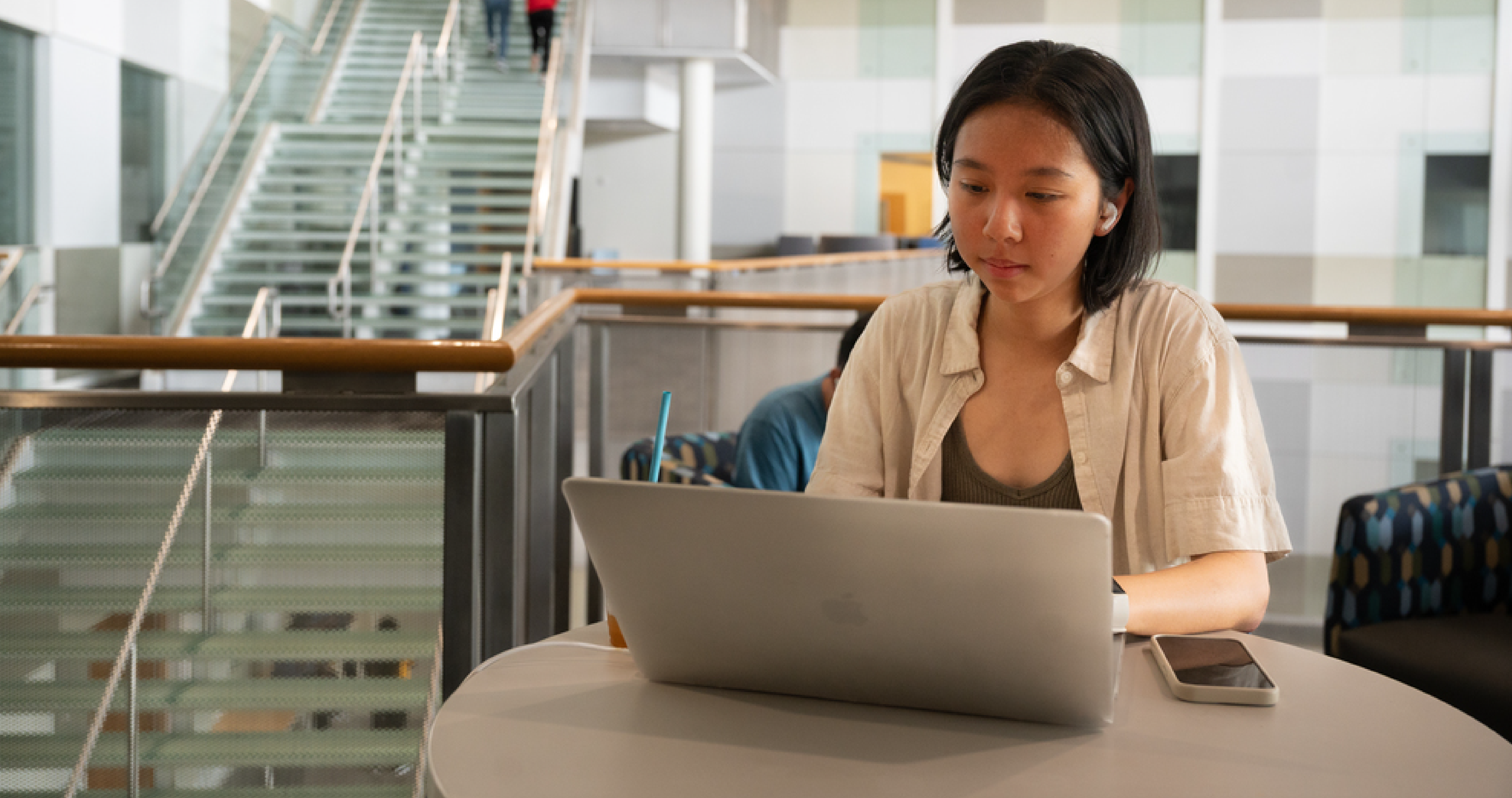 Student reading on laptop